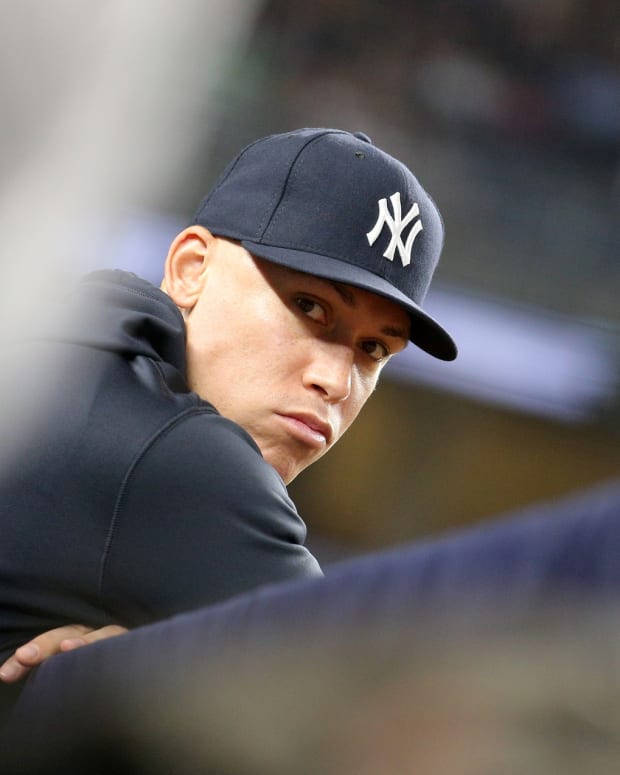 New York Yankees RF Aaron Judge looks on from dugout