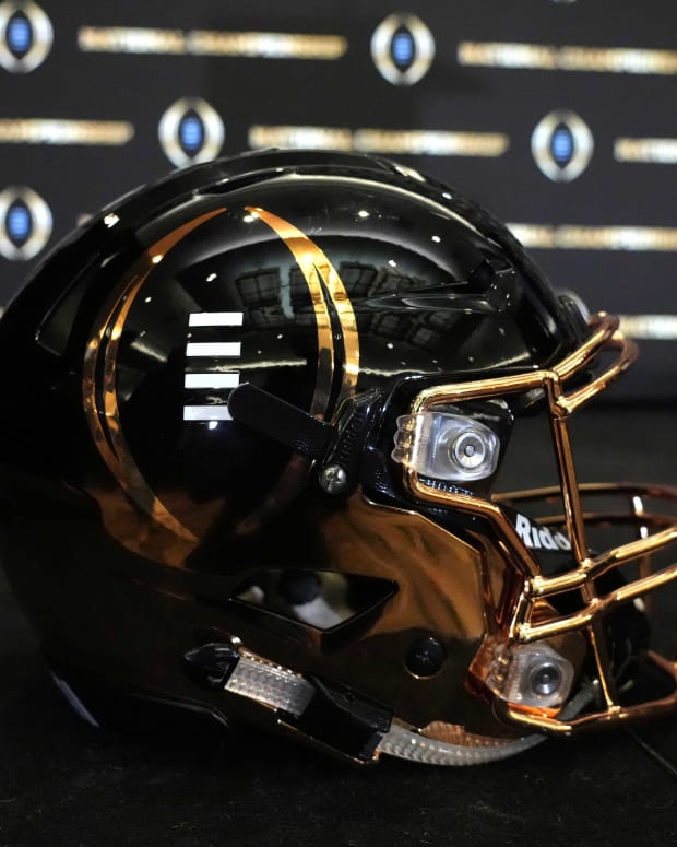 A detailed view of College Football Playoff National Championship logo helmet at 2022 Indianapolis Host Committee press conference at the JW Marriott.