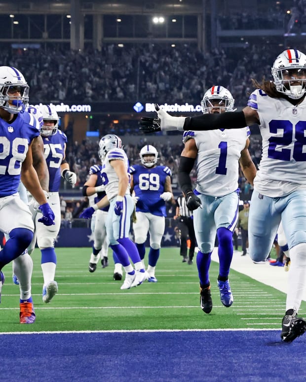 Dec 4, 2022; Arlington, Texas, USA; Dallas Cowboys safety Malik Hooker (28) recovers a fumble and runs it back for a touchdown during the fourth quarter against the Indianapolis Colts at AT&T Stadium.