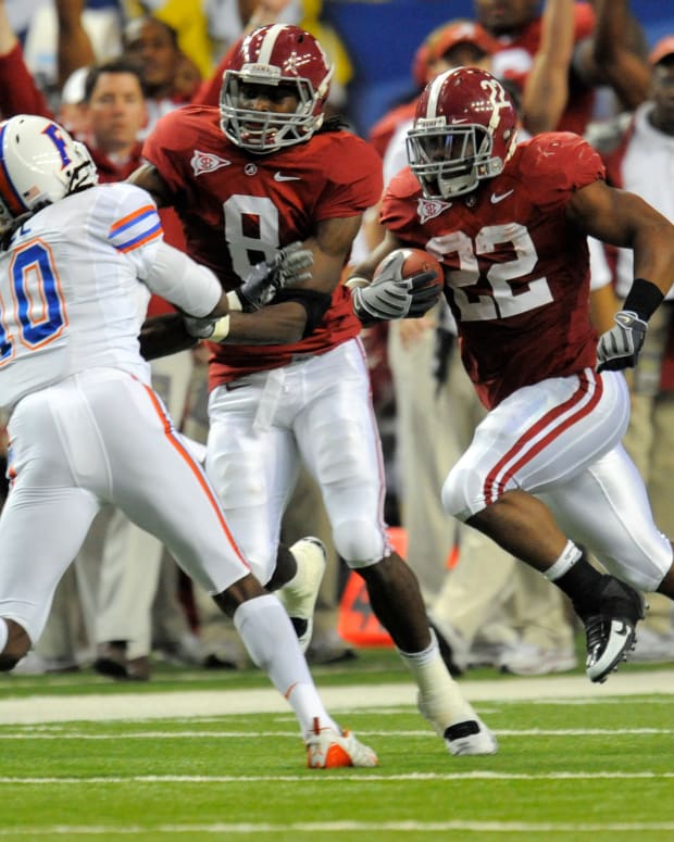 Alabama Crimson Tide running back Mark Ingram (22) takes a screen pass 69 yards during the second quarter of the 2009 SEC championship game against the Florida Gators at the Georgia Dome.