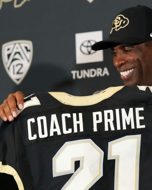 Coach Prime is all smiles at his introductory news conference