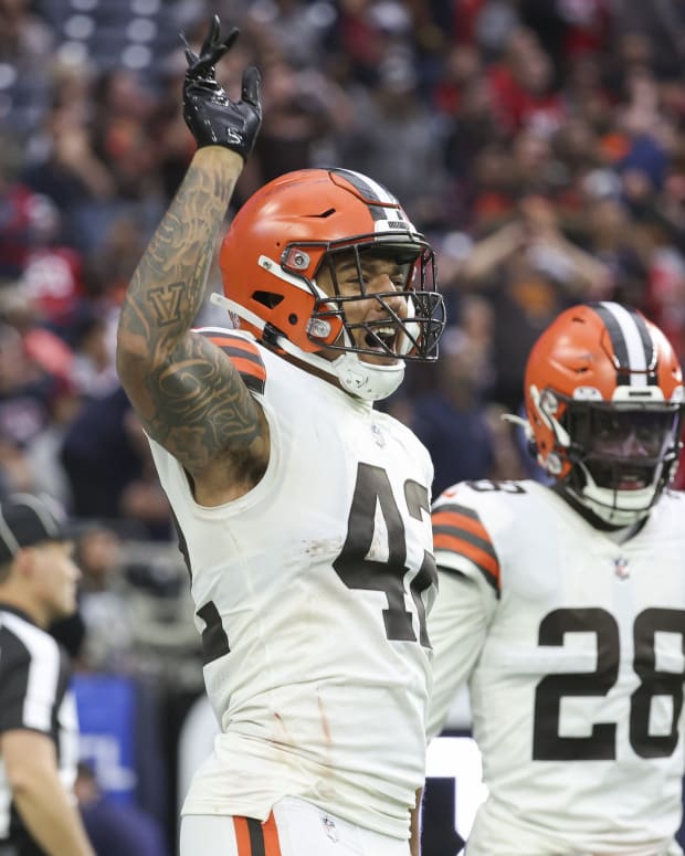 Dec 4, 2022; Houston, Texas, USA; Cleveland Browns linebacker Tony Fields II (42) reacts after returning an interception for a touchdown during the fourth quarter against the Houston Texans at NRG Stadium. Mandatory Credit: Troy Taormina-USA TODAY Sports
