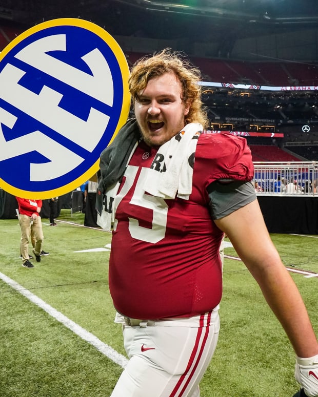 Alabama Crimson Tide offensive lineman Tommy Brown (75) celebrates winning the SEC Championship by defeating the Georgia Bulldogs at Mercedes-Benz Stadium.