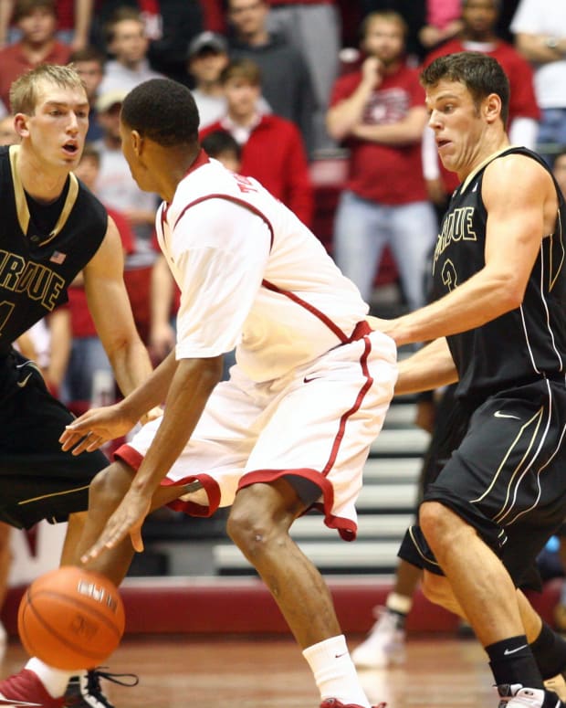 Purdue Boilermakers forward Robbie Hummel (4) and guard Chris Kramer (3) defend against Alabama Crimson Tide guard Mikhail Torrance (2) at Coleman Coliseum during their game in Dec. 2009. the programs haven't faced each other since 2011.