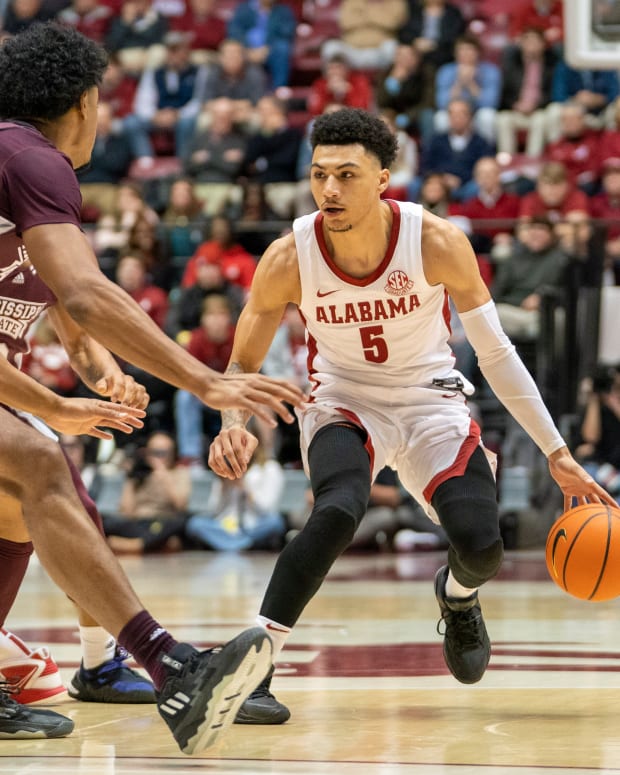 Alabama Crimson Tide guard Jahvon Quinerly (5) controls the ball against the Mississippi State Bulldogs during the first half at Coleman Coliseum.