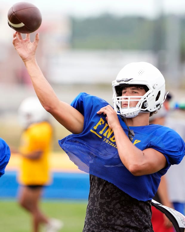 Aug 4, 2022; Findlay, OH, USA; Findlay quarterback Ryan Montgomery looks to throw the ball during practice at Findlay High School on August 4, 2022. Ryan's brother Luke is an offensive linemen committed to Ohio State. Ceb Osufb Montgomery Kwr 08