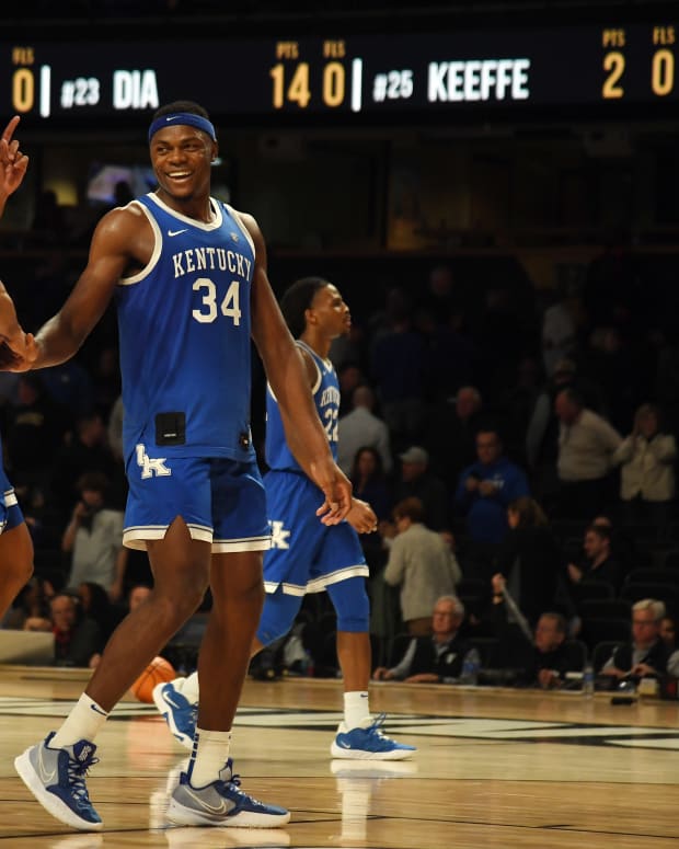 Jan 24, 2023; Nashville, Tennessee, USA; Kentucky Wildcats forward Jacob Toppin (0) and forward Oscar Tshiebwe (34) celebrate after a win against the Vanderbilt Commodores at Memorial Gymnasium