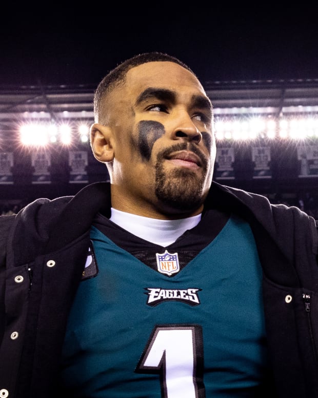 Philadelphia Eagles quarterback Jalen Hurts (1) walks off the field after a victory against the New York Giants in an NFC divisional round game at Lincoln Financial Field.