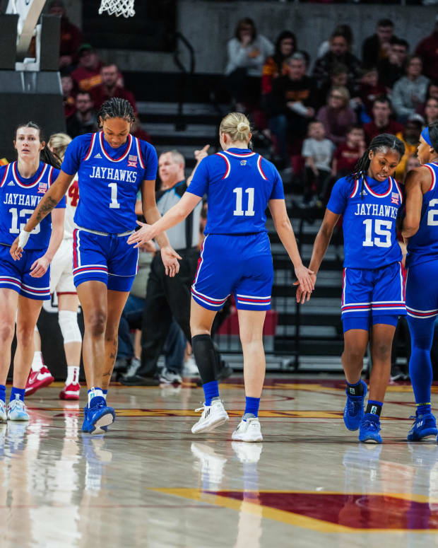 Kansas players Holly Kersgieter (13), Taiyanna Jackson (1), Sanna Strom (11), Zakiyah Franklin (15) and Chandler Prater (25) on the court in the first quarter against the Iowa State Cyclones.