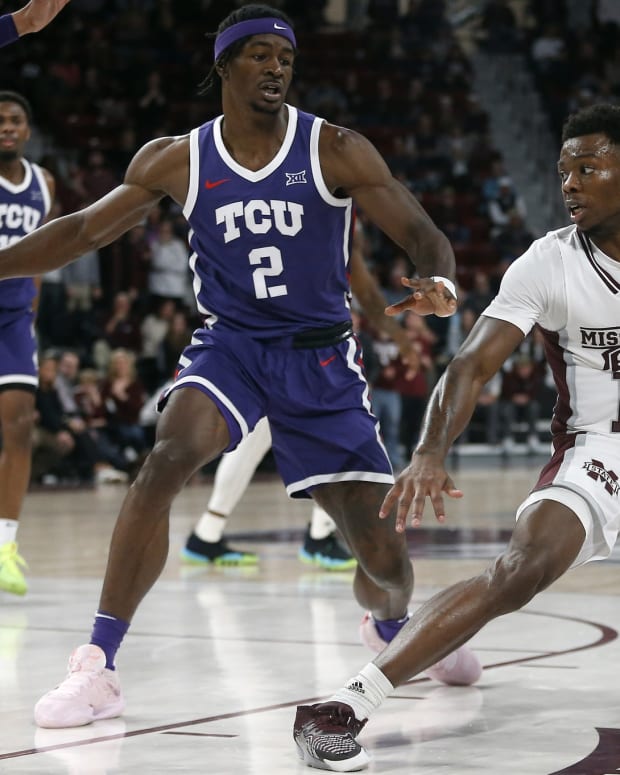 Mississippi State Bulldogs guard Dashawn Davis (10) dribbles as TCU Horned Frogs forward Emanuel Miller (2) defends during the second half at Humphrey Coliseum.