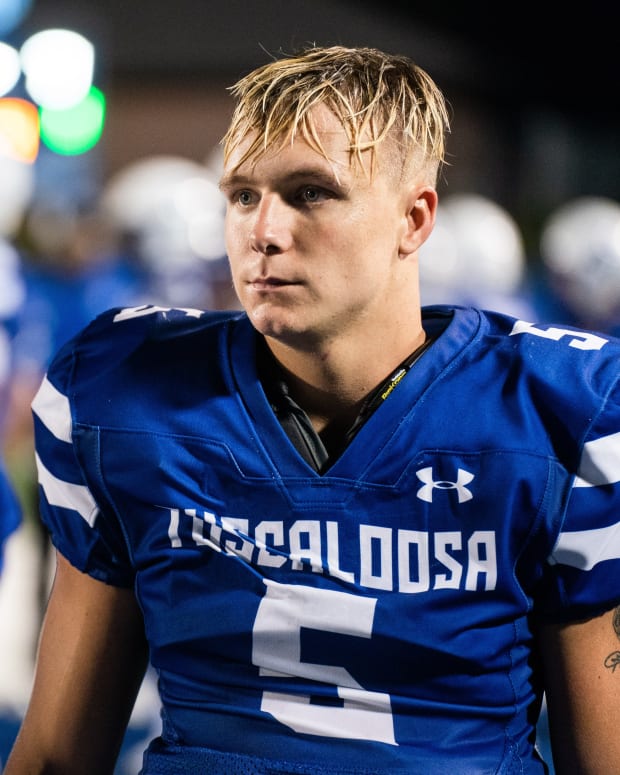 Tuscaloosa County High's quarterback Sawyer Deerman (5) watches the game from the sidelines at Tuscaloosa County High School Thursday, Sept. 8, 2022.