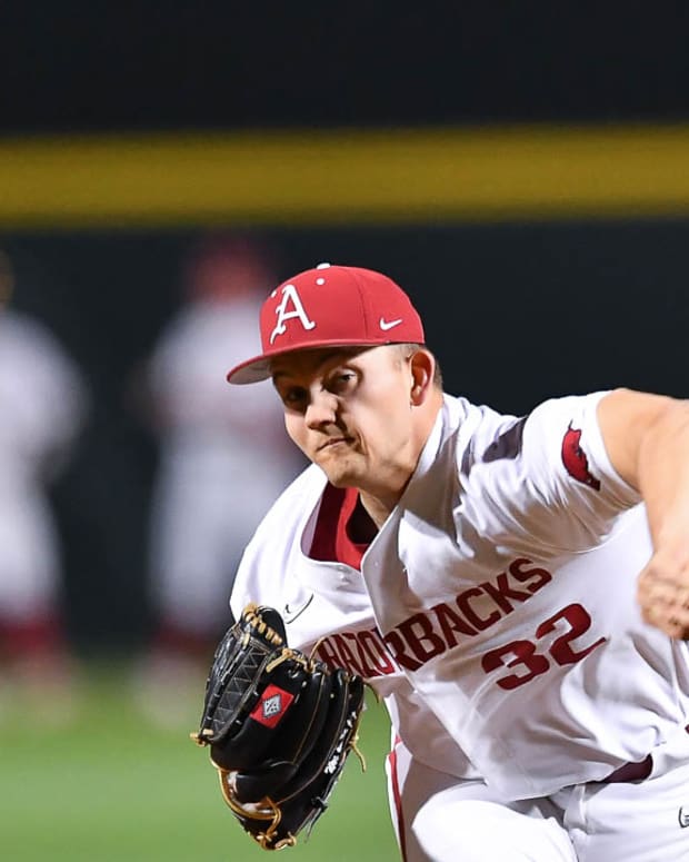 Razorbacks' pitcher Zack Morris warms up before coming into game against Alabama Crimson Tide on Friday night.
