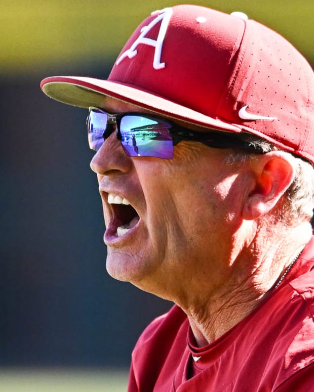 Razorbacks' coach Dave Van Horn yelling at home plate umpire Mark Winters during the eighth inning of a 9-6 win Saturday afternoon.