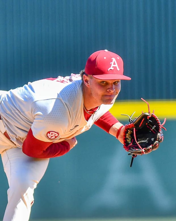 Razorbacks pitcher Dylan Carter throws a pitch against Tennessee on Sunday afternoon.