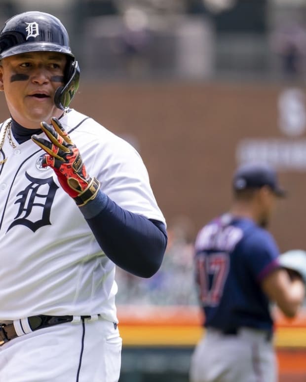 Jun 2, 2022; Detroit, Michigan, USA; Detroit Tigers designated hitter Miguel Cabrera (24) signals to the Minnesota Twins dugout after an at bat during the first inning at Comerica Park. Mandatory Credit: Raj Mehta-USA TODAY Sports