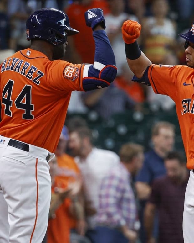 Jun 10, 2022; Houston, Texas, USA; Houston Astros left fielder Michael Brantley (23) celebrates with designated hitter Yordan Alvarez (44) after hitting a home run during the first inning against the Miami Marlins at Minute Maid Park. Mandatory Credit: Troy Taormina-USA TODAY Sports