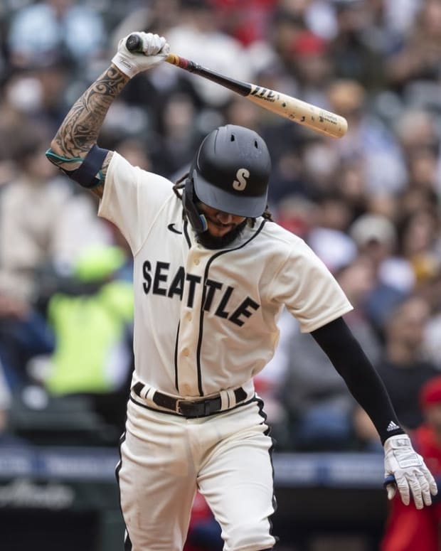 Jun 18, 2022; Seattle, Washington, USA; Seattle Mariners shortstop J.P. Crawford (3) reacts after flying out during the fifth inning against the Los Angeles Angels at T-Mobile Park. Mandatory Credit: Stephen Brashear-USA TODAY Sports