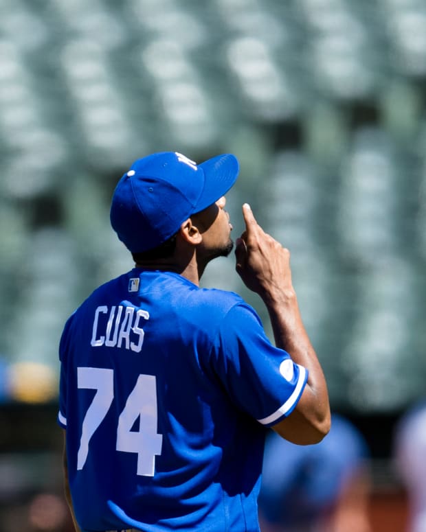 Jun 18, 2022; Oakland, California, USA; Kansas City Royals relief pitcher Jose Cuas (74) gestures after being replaced by manager Mike Matheny (22) during the eighth inning of the game against the Oakland Athletics at RingCentral Coliseum. Mandatory Credit: John Hefti-USA TODAY Sports