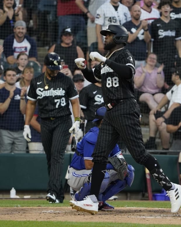 Jun 20, 2022; Chicago, Illinois, USA; Chicago White Sox center fielder Luis Robert (88) is greeted by right fielder Andrew Vaughn (25) after hitting a two run home run against the Toronto Blue Jays during the third inning at Guaranteed Rate Field. Mandatory Credit: David Banks-USA TODAY Sports