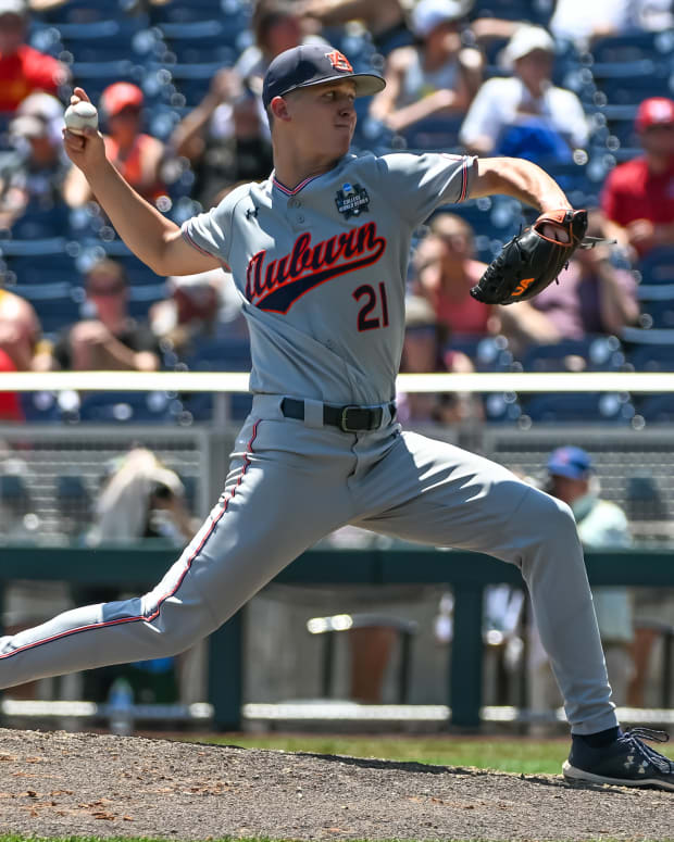 Jun 20, 2022; Omaha, NE, USA; Auburn Tigers pitcher Trace Bright (21) throws in the fourth inning at Charles Schwab Field. Mandatory Credit: Steven Branscombe-USA TODAY Sports