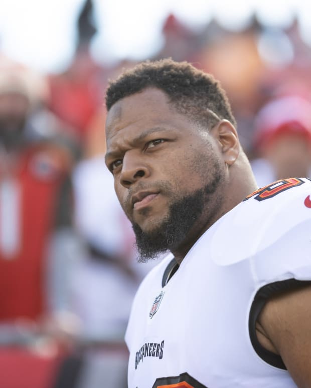 Jan 23, 2022; Tampa, Florida, USA; Tampa Bay Buccaneers defensive end Ndamukong Suh (93) walks onto the field before the game against the Los Angeles Rams during a NFC Divisional playoff football game at Raymond James Stadium. Mandatory Credit: Matt Pendleton-USA TODAY Sports