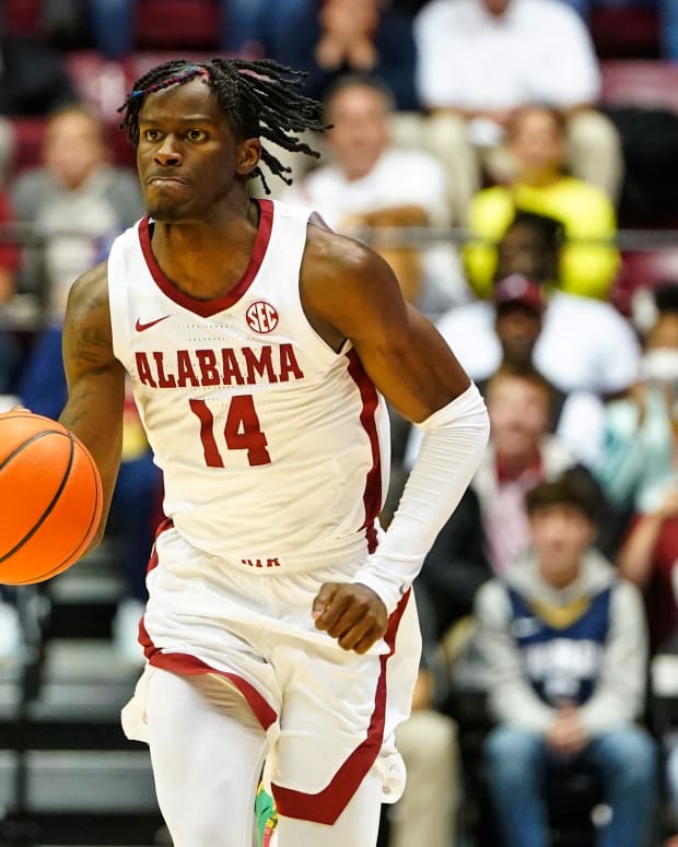 Alabama Crimson Tide guard Keon Ellis (14) brings the ball down court against Tennessee Volunteers during the second half at Coleman Coliseum. Photo | Marvin Gentry-USA TODAY Sports.