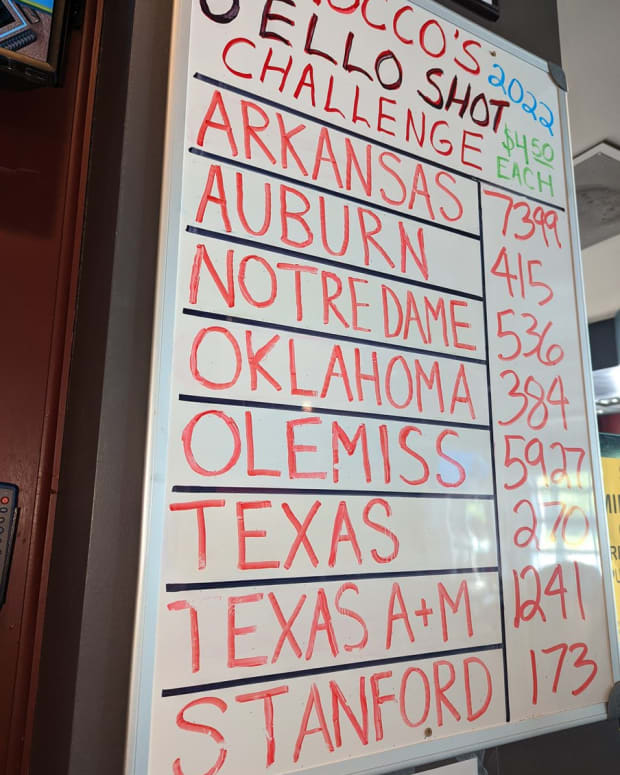 A white board at Rocco's in Omaha, Nebraska displays the current results from its annual Jello Shot Challenge during the College World Series.