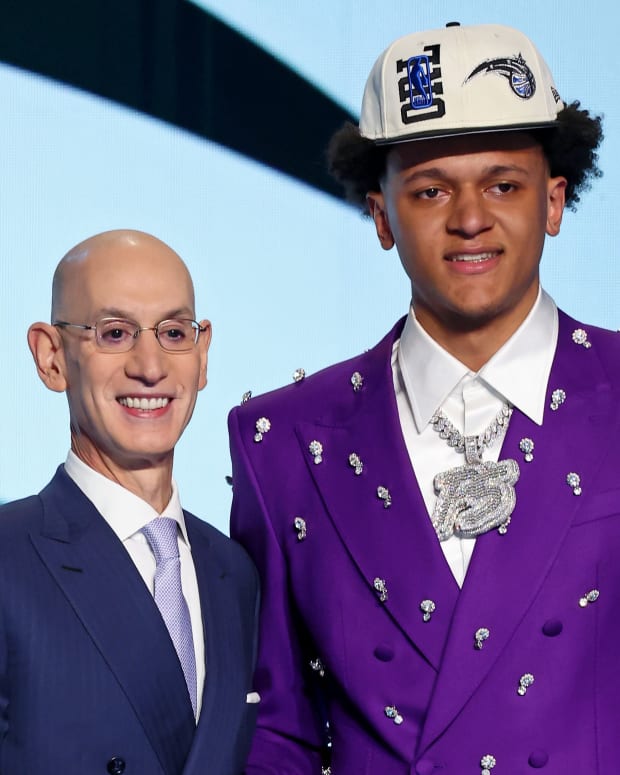 Paolo Banchero (Duke) shakes hands with NBA commissioner Adam Silver after being selected as the number one overall pick by the Orlando Magic in the first round of the 2022 NBA Draft at Barclays Center.