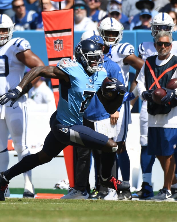 Sep 26, 2021; Nashville, Tennessee, USA; Tennessee Titans wide receiver Julio Jones (2) runs after a catch during the first half against the Indianapolis Colts at Nissan Stadium.
