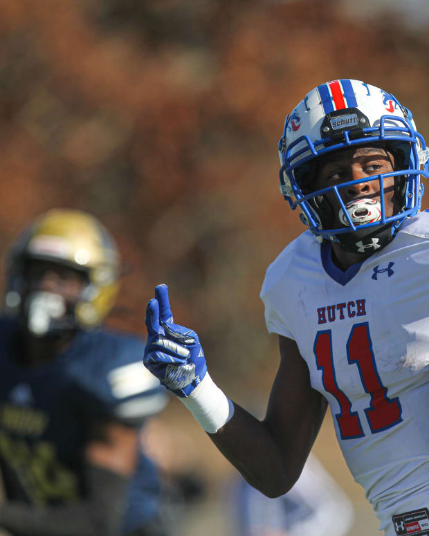 Hutchinson Blue Dragons receiver Malik Benson (11) scores on the opening play of the game in the KJCCC semifinals against the Independence Pirates Sunday, Nov 14, 2021 in Independence.