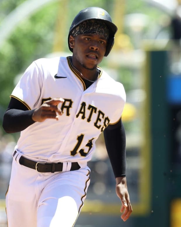 Jun 23, 2022; Pittsburgh, Pennsylvania, USA; Pittsburgh Pirates third baseman Ke'Bryan Hayes (13) runs the bases on his way to scoring against the Chicago Cubs during the fifth inning at PNC Park. Mandatory Credit: Charles LeClaire-USA TODAY Sports