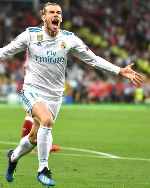 Gareth Bale pictured celebrating after scoring for Real Madrid in the 2018 Champions League final against Liverpool