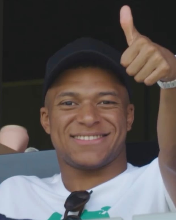 Kylian Mbappe pictured giving a thumbs up from the crowd during LAFC's 2-0 win over New York Red Bulls in June 2022