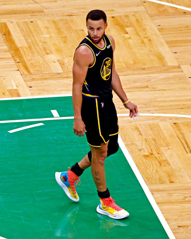 Steph Curry wears #RetireInequality shoes in Game 3 of the 2022 NBA Finals.