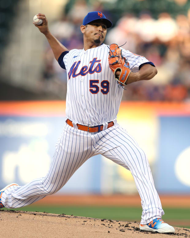 Jun 28, 2022; New York City, New York, USA; New York Mets starting pitcher Carlos Carrasco (59) pitches against the Houston Astros during the first inning at Citi Field.