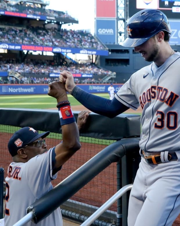 Jun 28, 2022; New York City, New York, USA; Houston Astros right fielder Kyle Tucker (30) celebrates his three run home run against the New York Mets with manager Dusty Baker Jr. (12) during the first inning at Citi Field. Mandatory Credit: Brad Penner-USA TODAY Sports