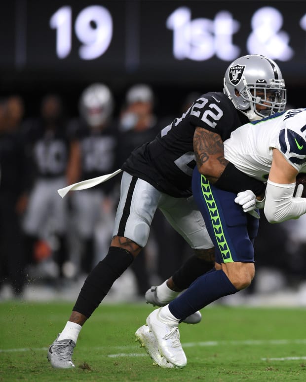NFL: Seattle Seahawks at Las Vegas Raiders Aug 14, 2021; Paradise, Nevada, USA; Seattle Seahawks wide receiver Cody Thompson (11) is tackled by Las Vegas Raiders defensive back Keisean Nixon (22) during the first quarter at Allegiant Stadium.