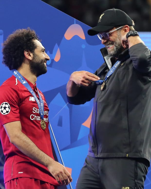 Mo Salah (left) and Jurgen Klopp pictured after the 2019 UEFA Champions League final, which Liverpool won by beating Tottenham 2-0