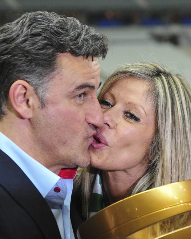 Christophe Galtier pictured kissing his wife after leading Saint-Etienne to glory in the 2013 Coupe de la Ligue final