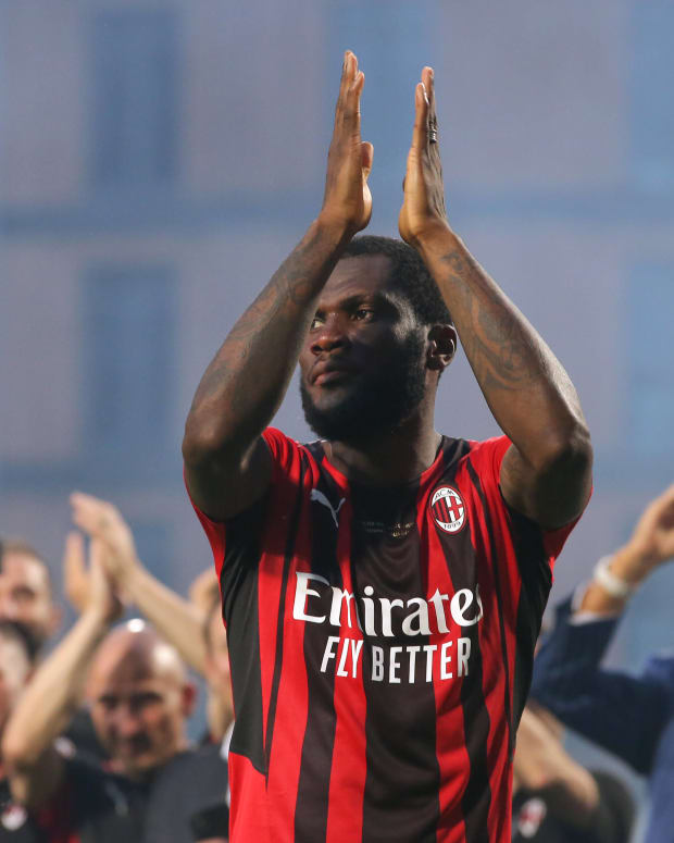 Franck Kessie pictured applauding AC Milan fans after playing his final game for the club in May 2022
