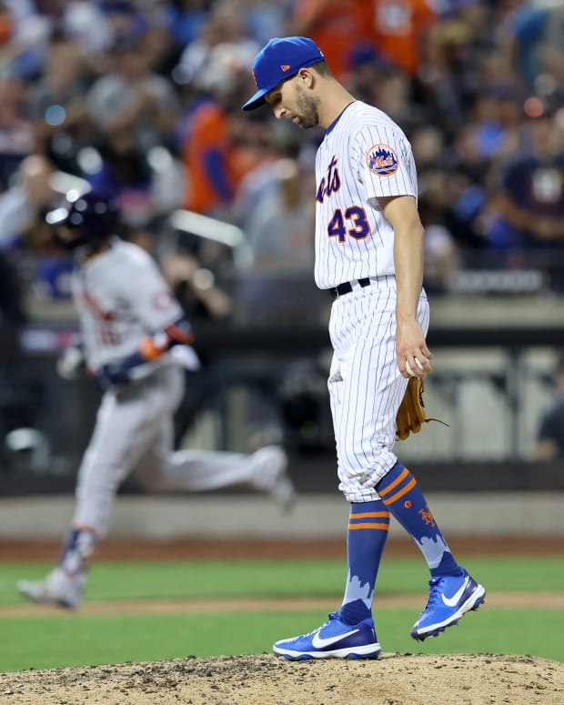 Jun 28, 2022; New York City, New York, USA; New York Mets relief pitcher Chasen Shreve (43) reacts after giving up a two run home run to Houston Astros first baseman Yuli Gurriel (10) during the fifth inning at Citi Field.