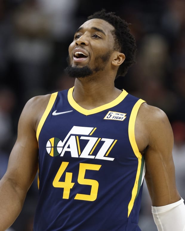 Utah Jazz guard Donovan Mitchell (45) reacts during overtime against the Memphis Grizzlies at Vivint Arena.