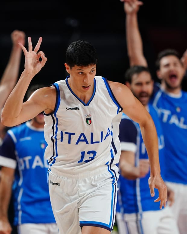 Italy player Simone Fontecchio (13) reacts after a made three point basket during the Tokyo 2020 Olympic Summer Games at Saitama Super Arena.