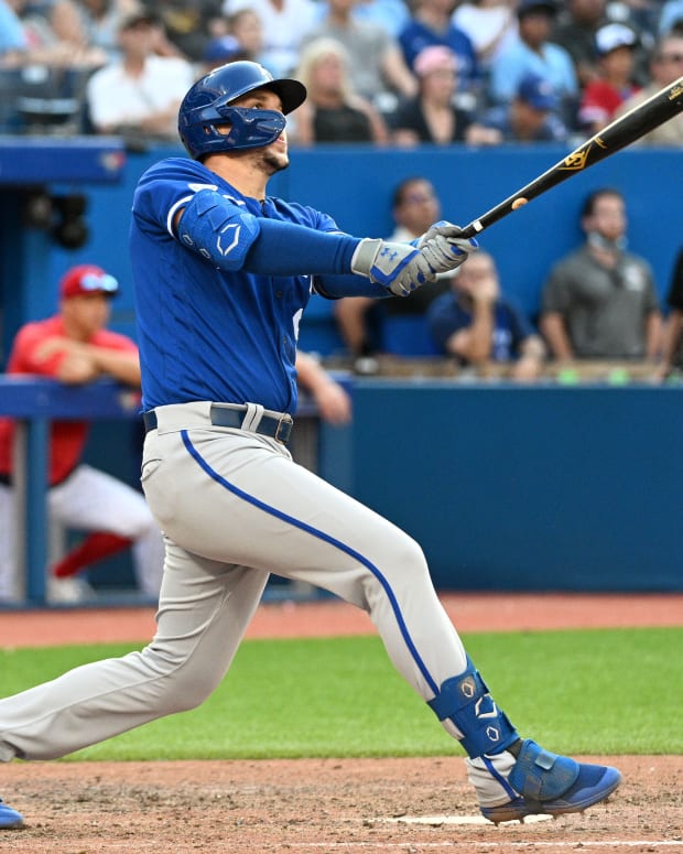 Jul 16, 2022; Toronto, Ontario, CAN; Kansas City Royals designated hitter Vinnie Pasquantino (9) hits a two-run home run against the Toronto Blue Jays in the 10th inning at Rogers Centre. Mandatory Credit: Dan Hamilton-USA TODAY Sports