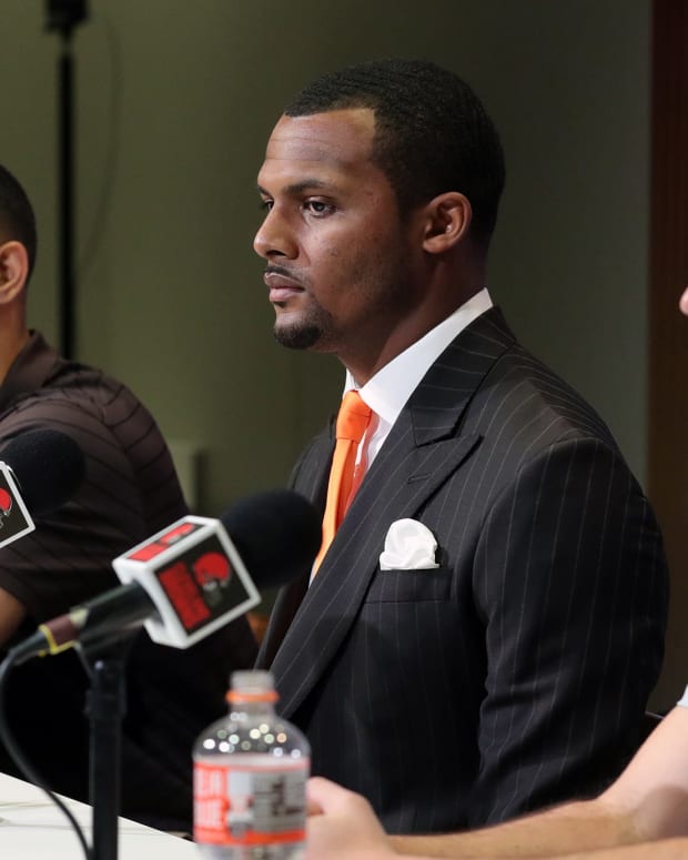 Cleveland Browns quarterback Deshaun Watson, center, along with General Manager Andrew Berry, left, and head coach Kevin Stefanski, right, field questions from reporters during Watson's introductory press conference at the Cleveland Browns Training Facility in Berea. Watsonpress File 3