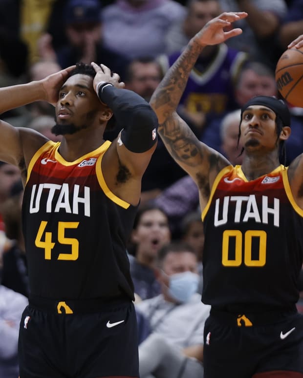 Utah Jazz guard Donovan Mitchell (45) and guard Jordan Clarkson (00) react after a call in the fourth quarter against the Sacramento Kings at Vivint Arena.