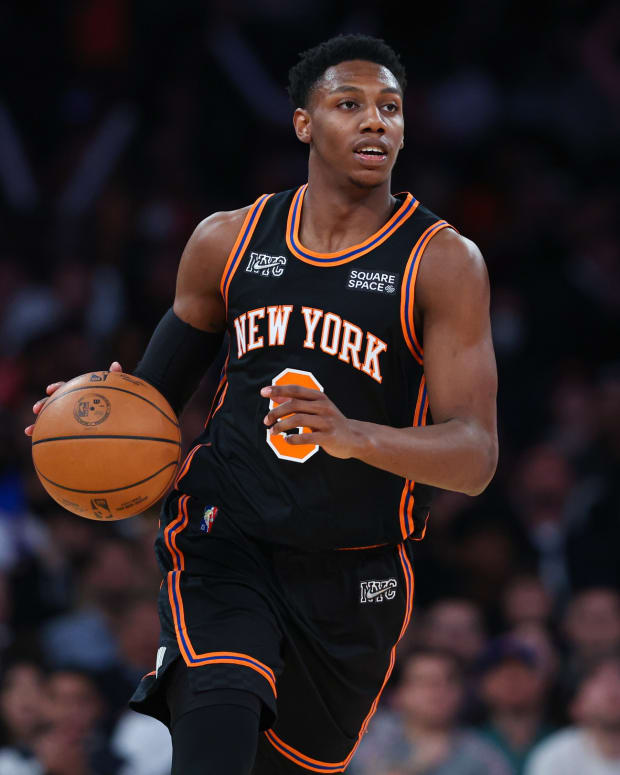 New York Knicks guard RJ Barrett (9) dribbles up court during the second half against the Atlanta Hawks at Madison Square Garden.