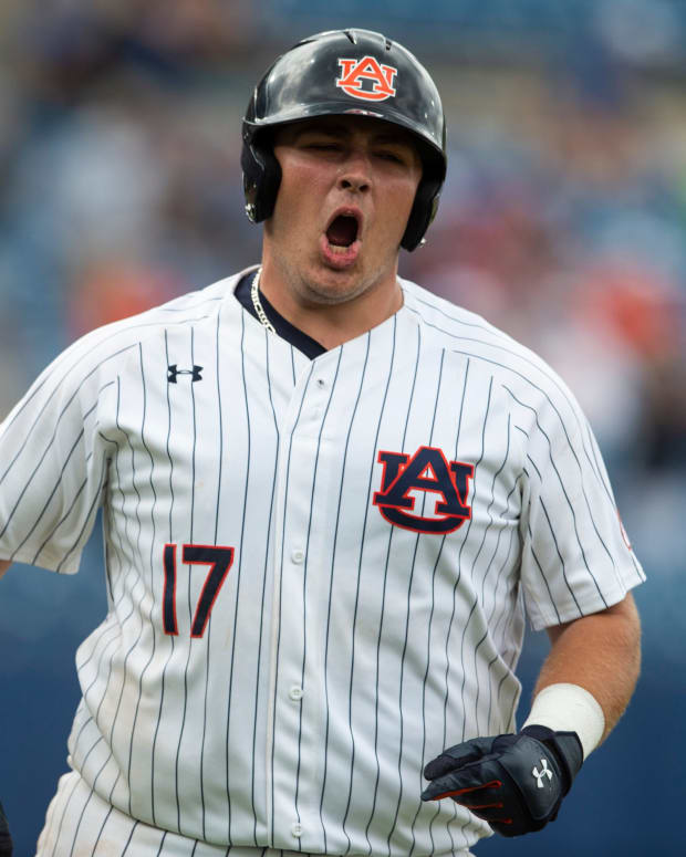 Auburn Tiger s Sonny Dichiara (17) celebrates his home run the first base line during the SEC baseball tournament at Hoover Metropolitan Stadium in Hoover, Ala., on Wednesday, May 25, 2022.