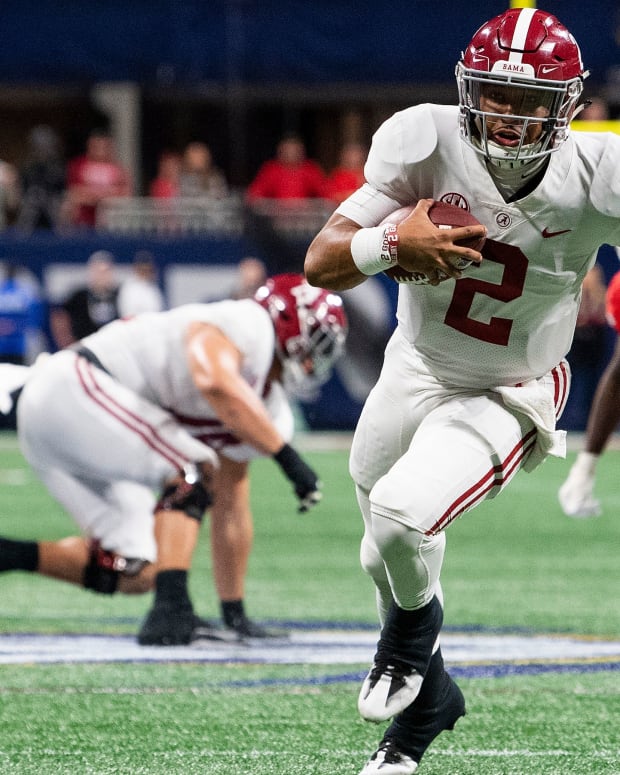 Alabama quarterback Jalen Hurts (2) carries for the go ahead touchdown against Georgia in the SEC Championship Game at Mercedes Benz Stadium in Atlanta, Ga., on Saturday December 1, 2018.