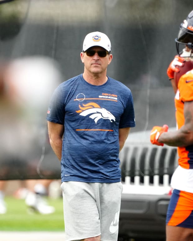 Denver Broncos general manager George Paton observes OTA workouts at the UC Health Training Center.